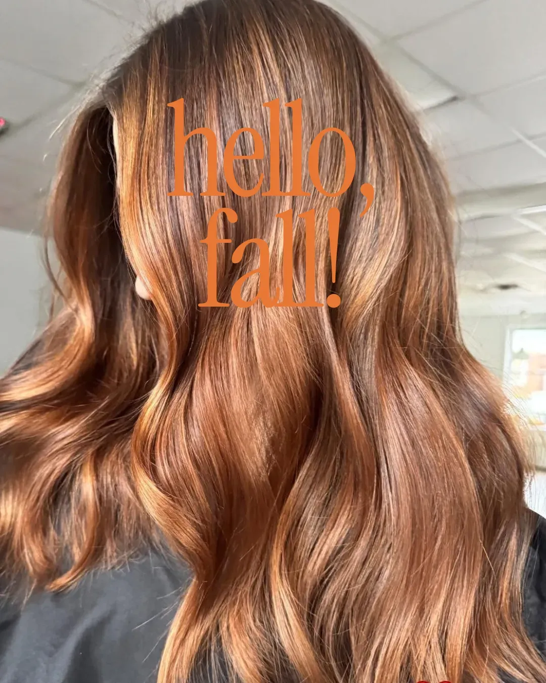 Long glossy copper and caramel balayage waves with the words hello, fall