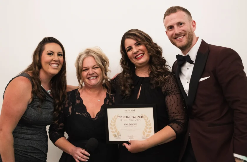 Amber and the Root & Bloom team receiving recognition at an industry awards evening